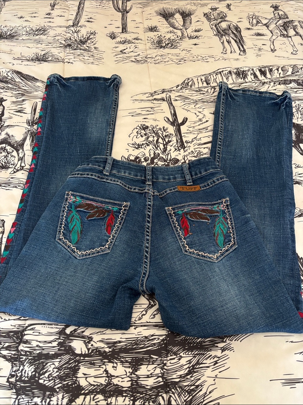 Cowgirl Tuff Blue Boot Cut Jeans with Turquoise & Red Feather Embroidery